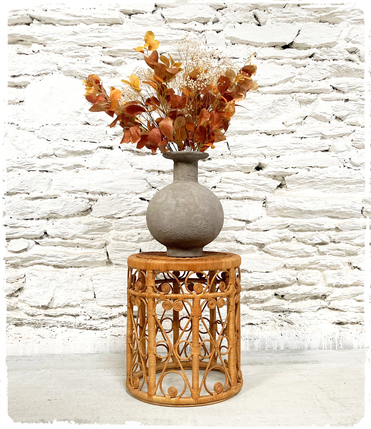 Tabouret Porte Plantes Vintage Peacock en Rotin